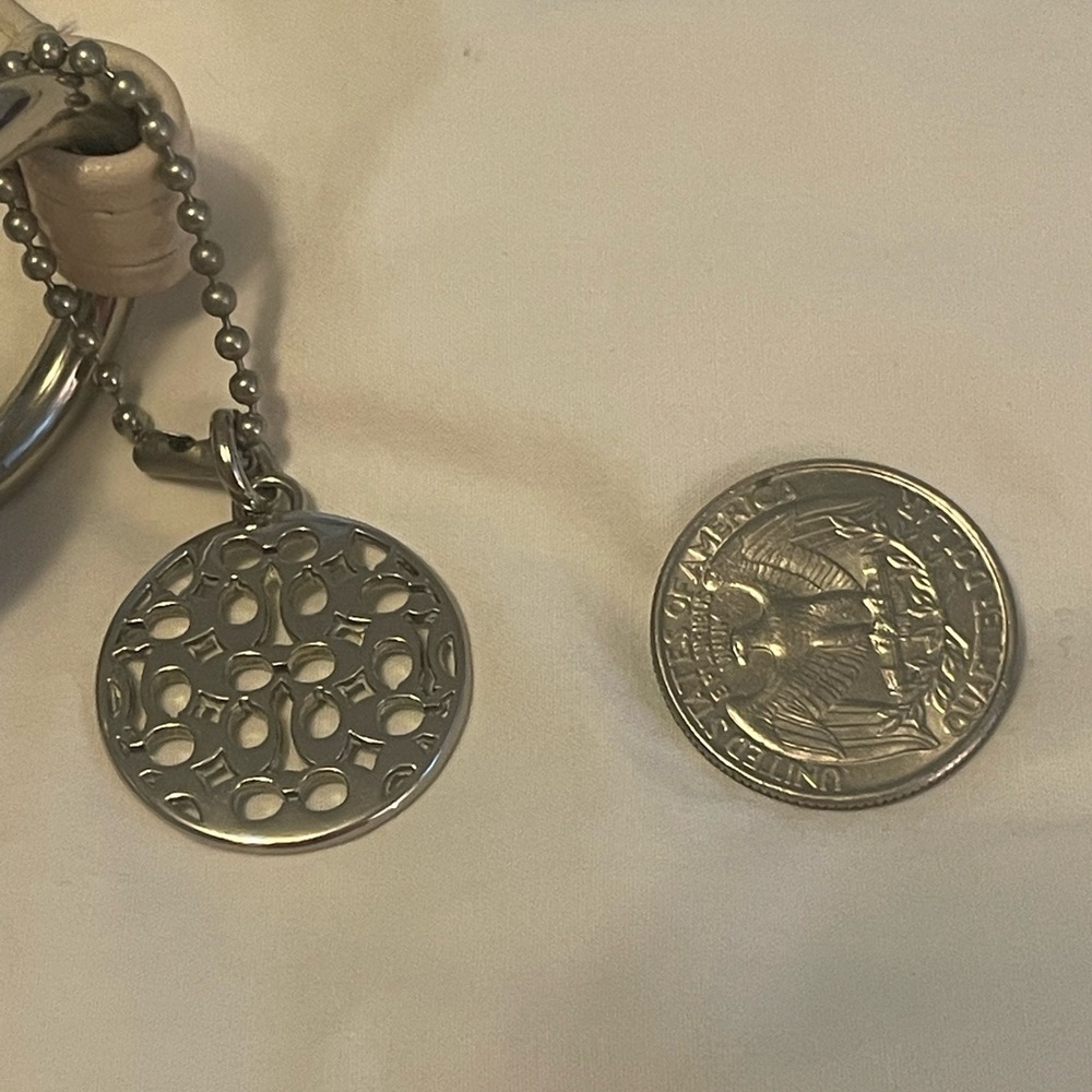Cream Coach bag with rare OP Art silver nickel metal bag charm hang tag. - Picture 9 of 13